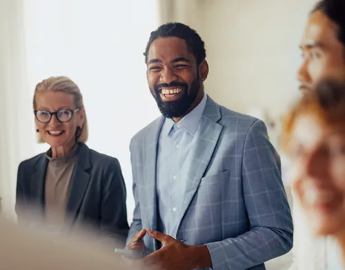 Man in a suit smiling