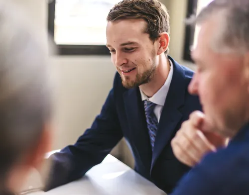 Male business professional smiling