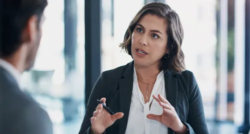 Woman speaking to her client