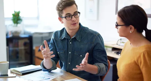 Two students studying for their exams
